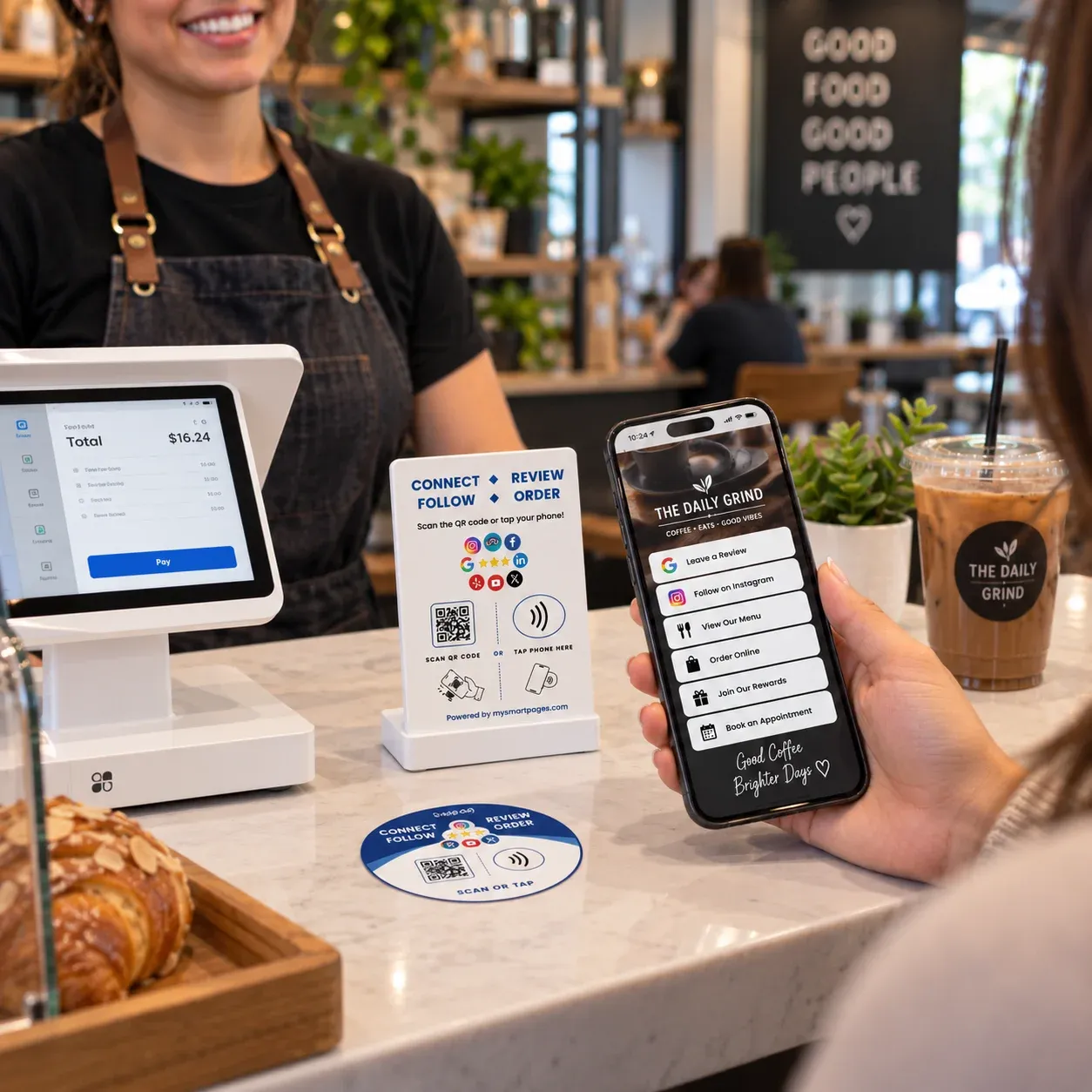 A customer opens a merchant Smart Page on her phone at a Clover counter with NFC stands.